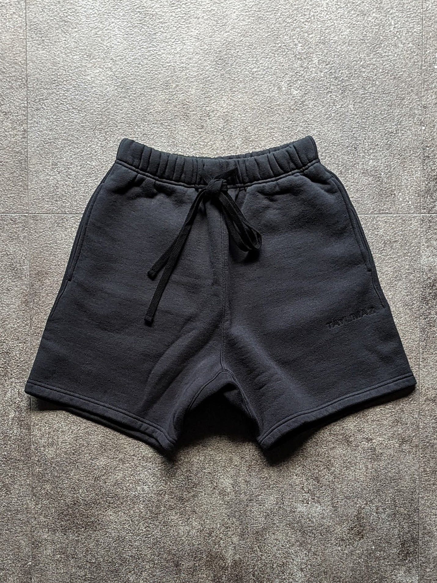 Short sweat en coton lavé noir