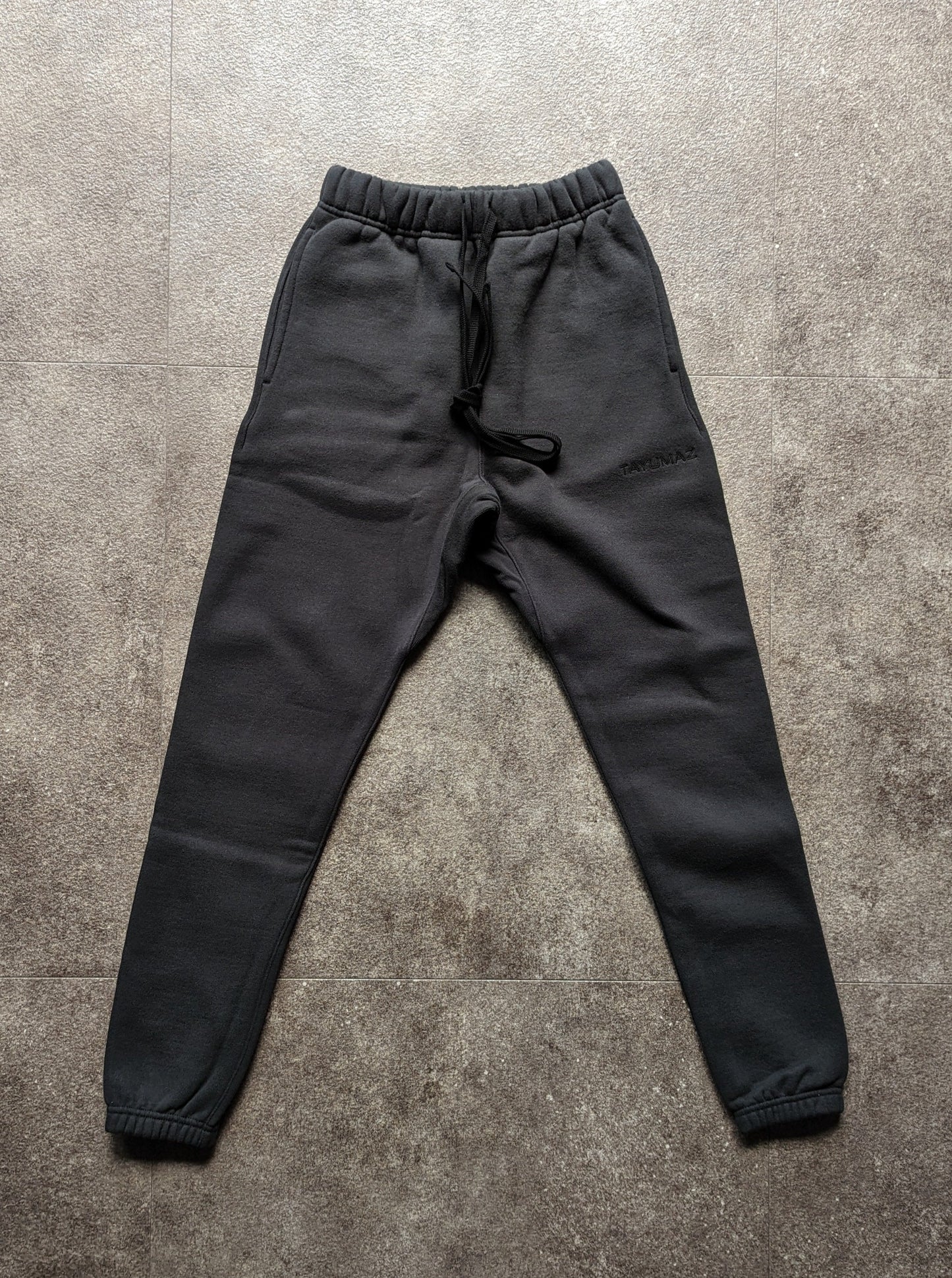 Washed cotton sweatpants in black